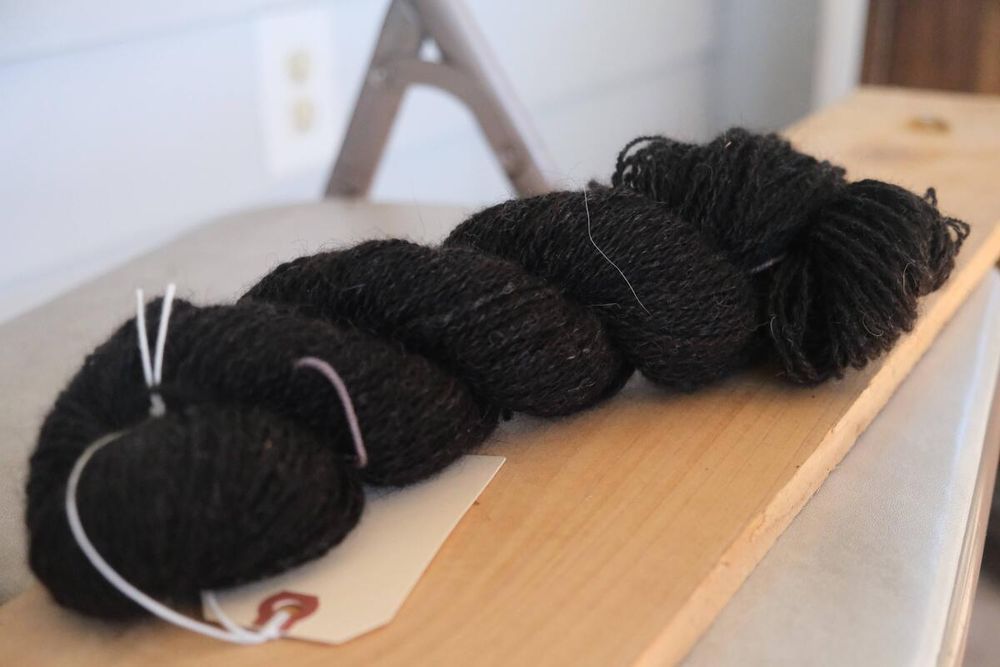 a skein of black handspun yarn